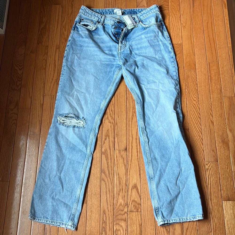 US size 12 women’s boyfriend jeans. Button down front. Never worn. Tags still on